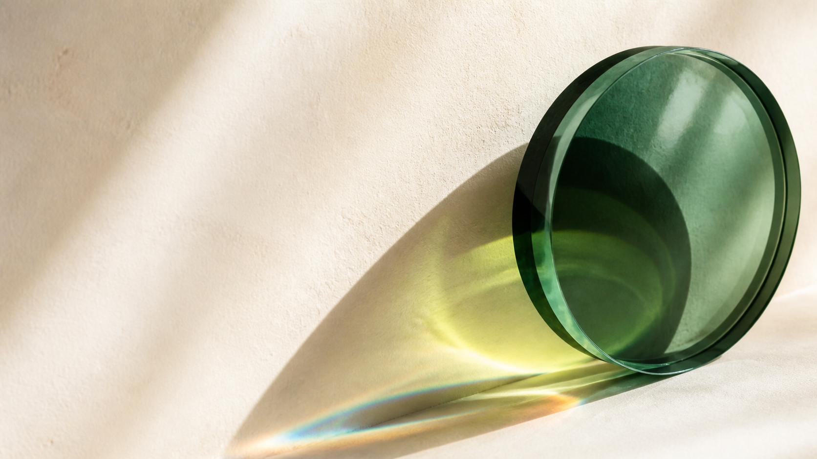 Green optical glass casting a spectrum of color, used as the EyesX color preview